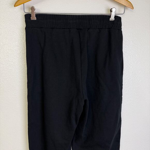 ALO Yoga Courtside Tearaway Snap Pants Womens Medium Black Warm Up Gym 31.5" - Picture 6 of 10